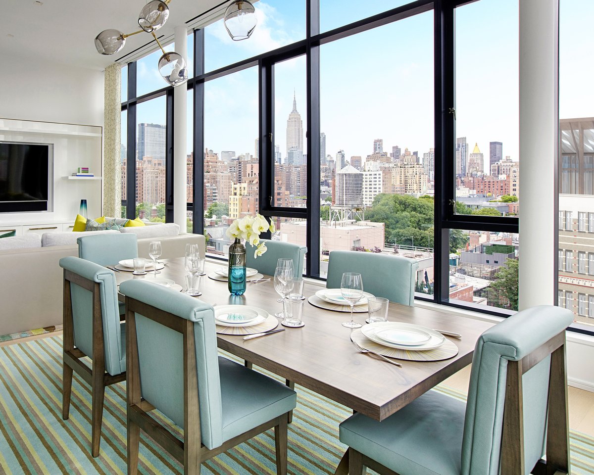 Jamie Stern produced six bespoke dining chairs in a custom turquoise Barcelona leather for this beautiful NYC apartment! #jamiesterndesign #customfurniture #furniture #nycdesign #leatherfurniture #leatherdeisign #furnituredesign #leather #residentialdesign #nycinteriordesign