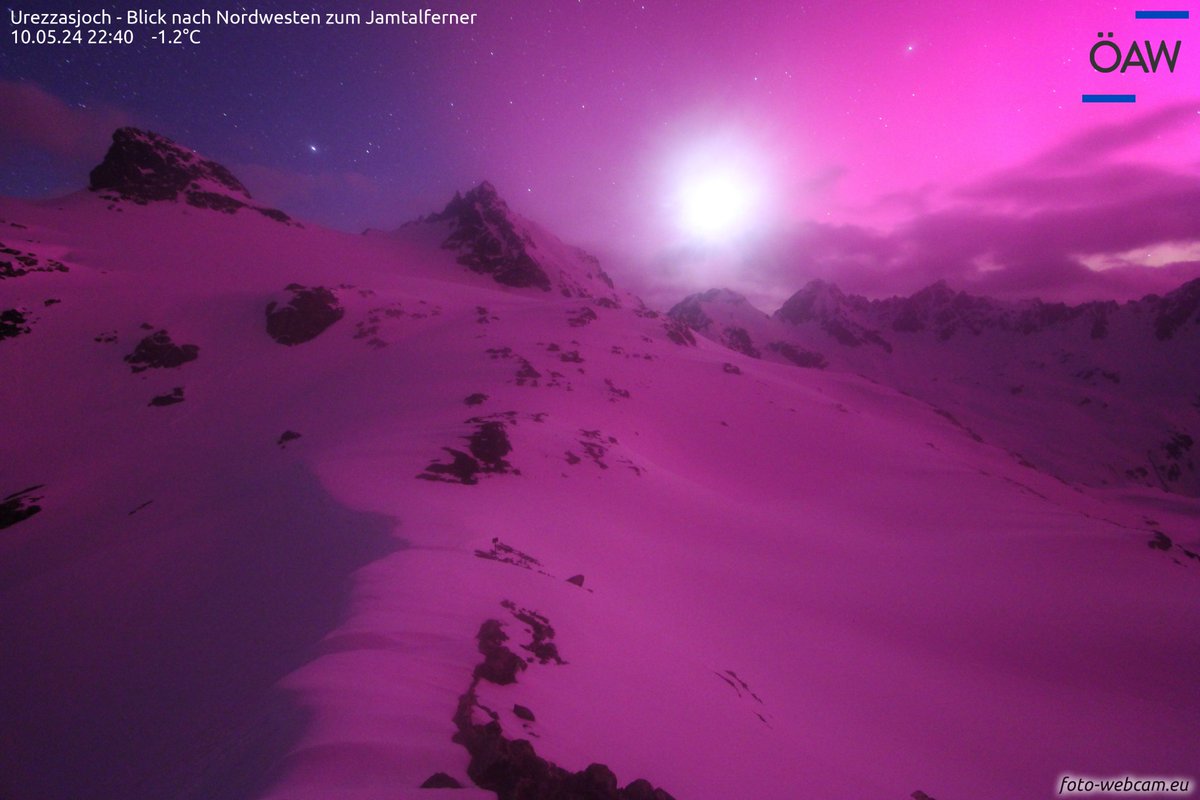 Aurora Borealis and the Moon from the Alps