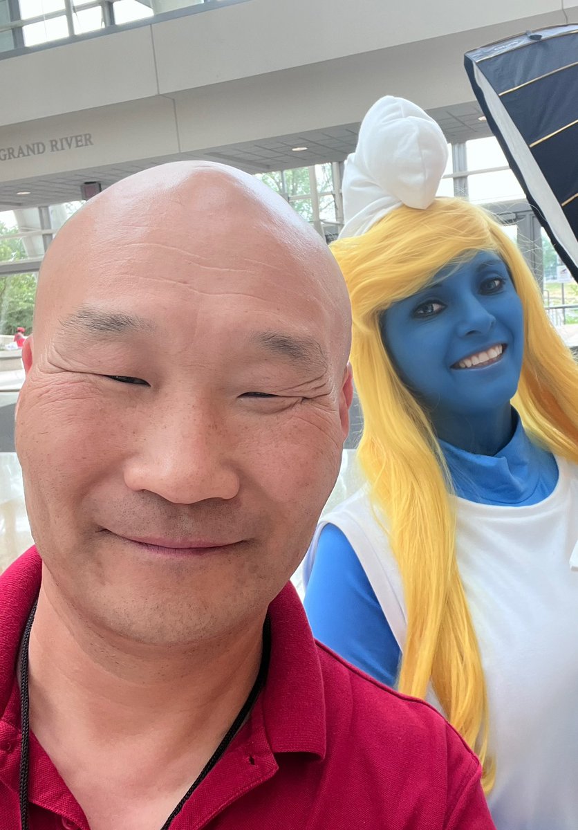 It’s another #photographerfriday! Here’s @FEdgePhoto at @JAFAX last summer, taking photos of cosplayers including a certain #Smurfette. 💙🌼 Bodypaint by @mehronmakeup Cosplay by me Contacts by @uniqso; use code UNIQSOAMHC for a discount on your own! #cosplay #smurfs