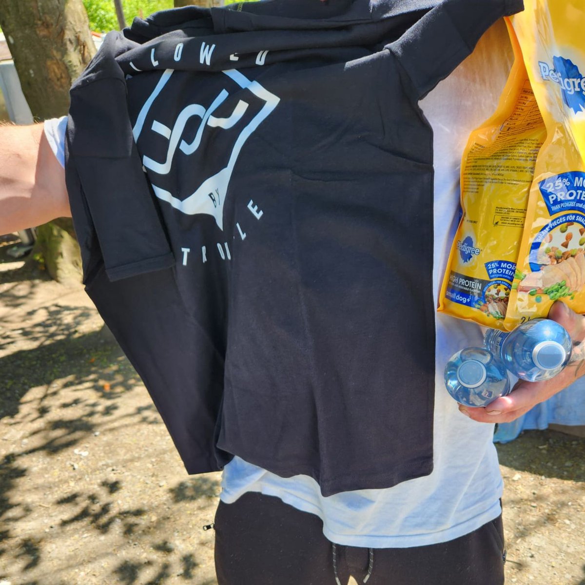 GNFK volunteers handed out t-shirts to community members living in encampments - contact Raman (raman@gnfk.org) to help!