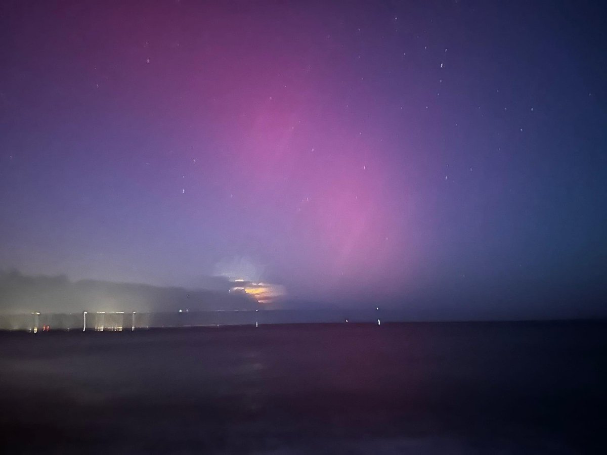 Aurora showing up (with some lightning) in Tybee Island, Georgia.