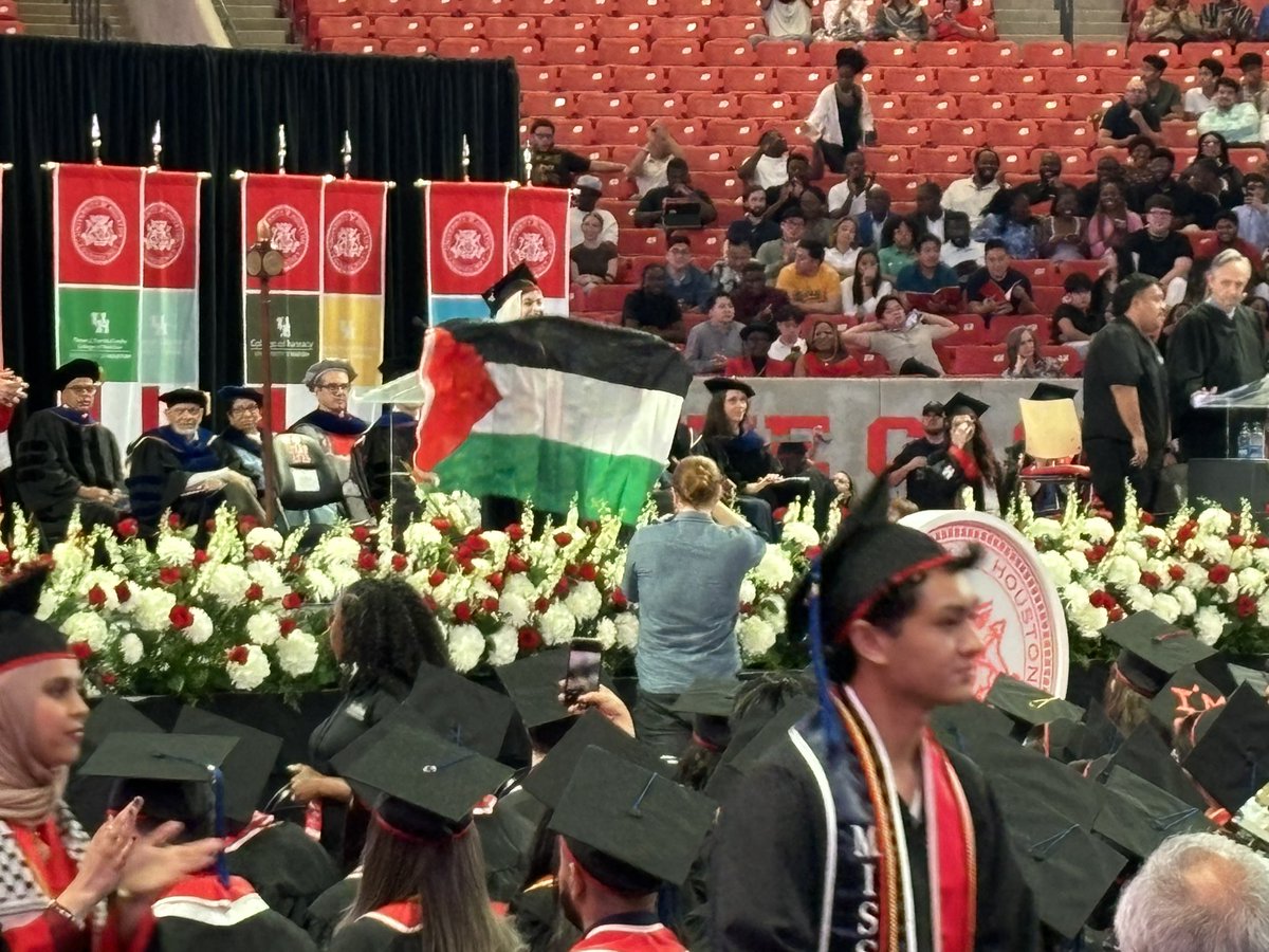 University of Houston commencement ceremony today.  There were 6 or 7 of these morons that displayed the Palestinian flag as they walked across the stage.

Shameful.
