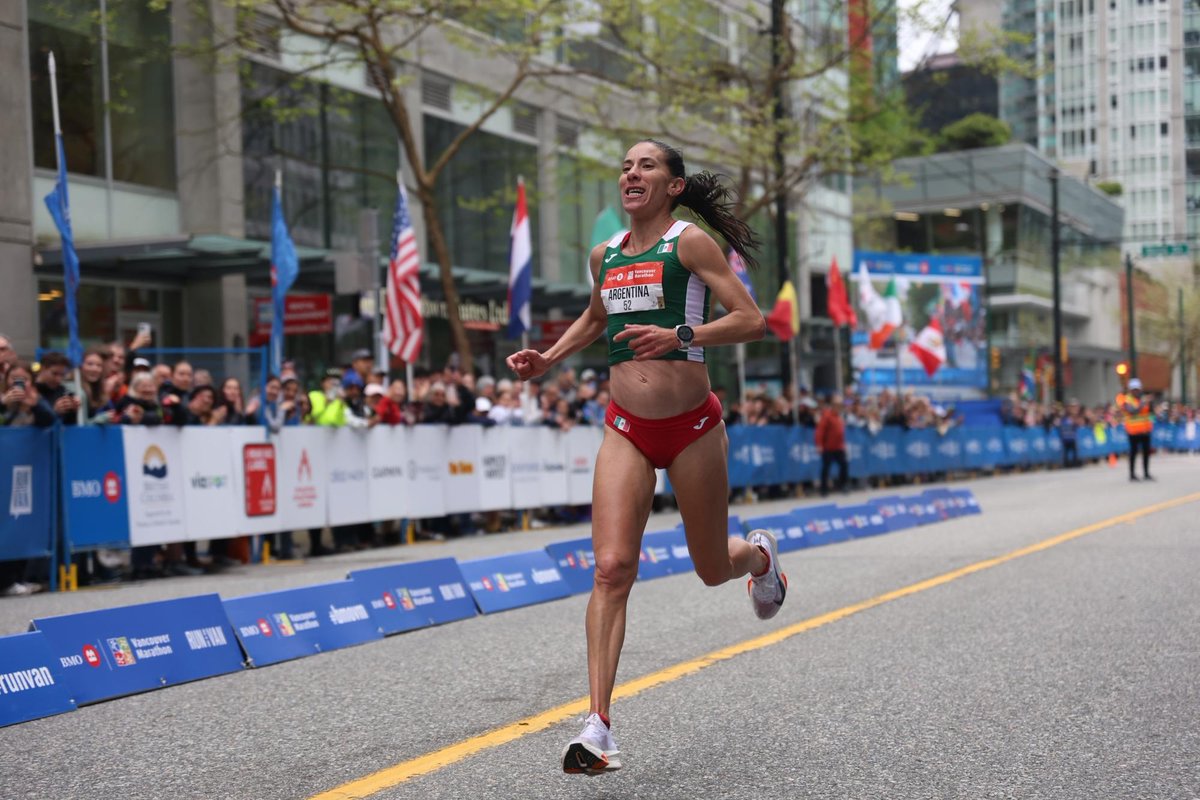 Awesome action shots this year! View yours: bmovanmarathon.ca/photos #bmovm #runvan