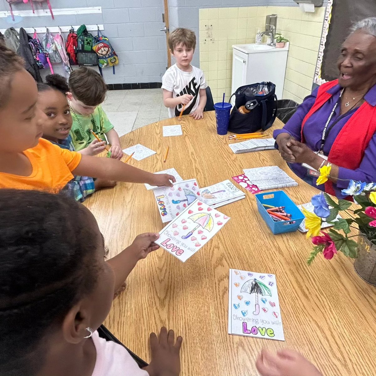 Our first grade students surprised one of our amazing volunteers, Grandma Hart, with cards they made to show how much they appreciate her! #CJSmith #volunteers #kindness #WeareHCS