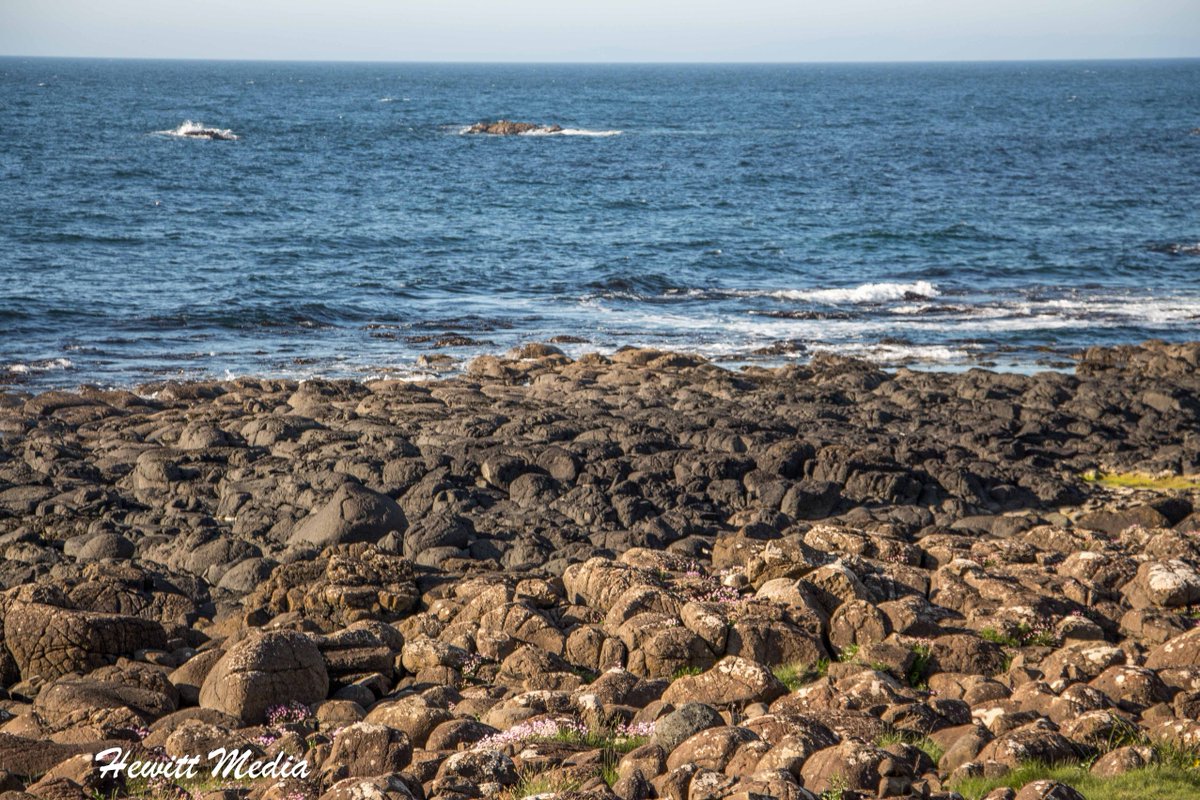 The Giant's Causeway in Northern Ireland is a fascinating destination.  Learn more about when and how to visit in my Giant's Causeway Visitor Guide.  #Travel #Ireland #NorthernIreland #TravelGuide #TravelBlog wanderlustphotosblog.com/2018/02/14/the…