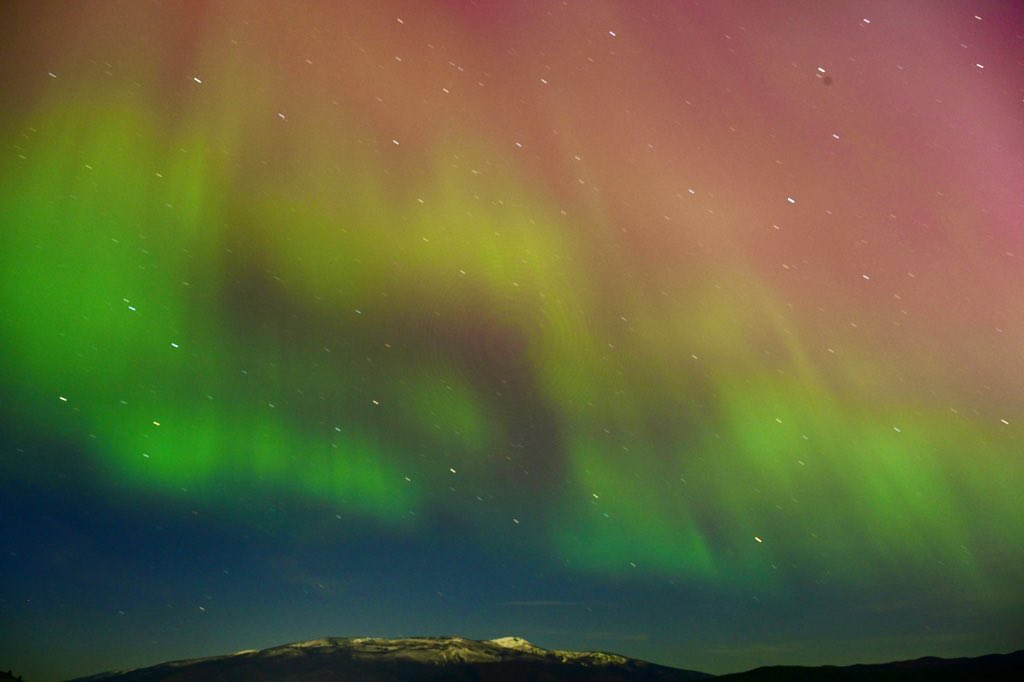 The Aurora Borealis shimmers over Lolo Peak in Missoula, Montana. | May 11, 2024. | #Auroraborealis