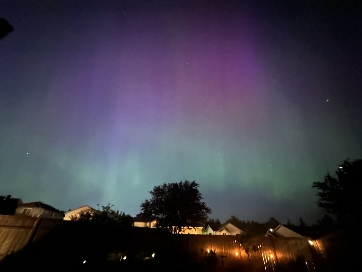 CrystalJClarity's tweet photo. I’ve wished my entire life to see the Northern Lights.  I’m in absolute awe tonight.  @NWS @NWSSeattle #SolarStorm https://t.co/fzfGzPoXy7