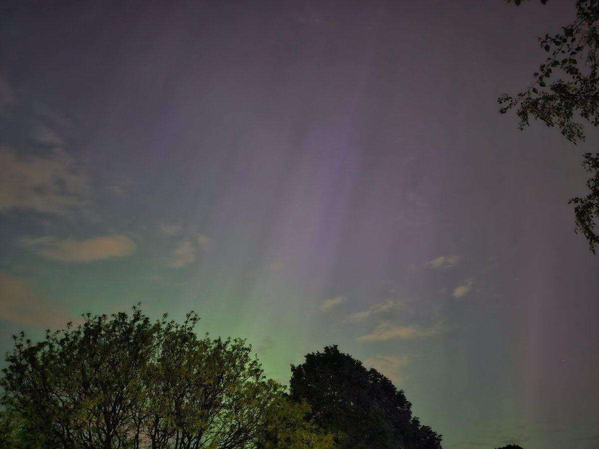 Captured the aurora over my house this evening with my cell phone camera.
