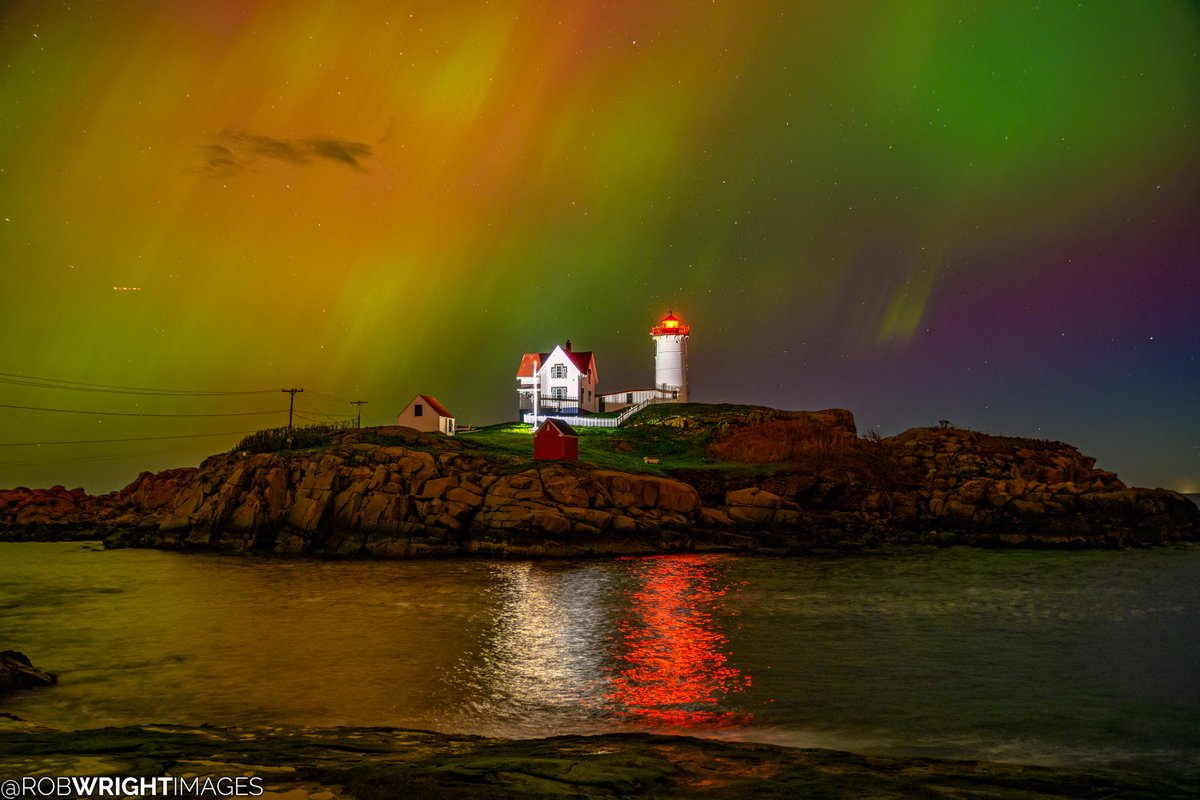 Is this real life?!! Aurora over the Nubble Lighthouse!! -- May 10, 2024 10:21 PM EDT York, Maine #aurora #northernlights #stormhour @tamithaskov