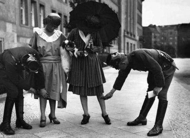 Cops looking for the length of the girl's skirt. Berlin (1922)