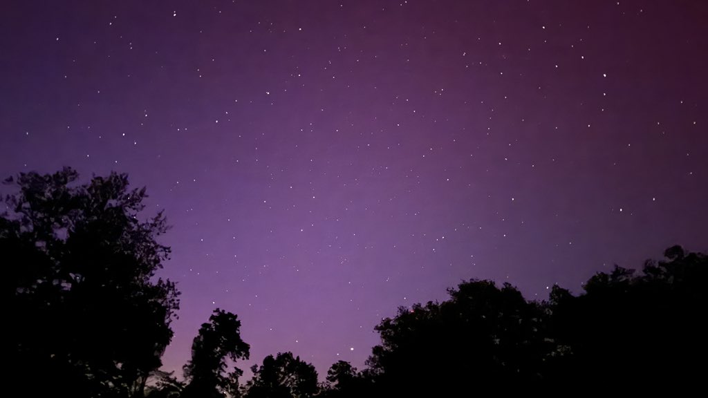 Wow! I can see a little tint with the naked eye but the camera definitely is picking up the color from the aurora ! I take a lot of night sky photos and never seen this color before. Incredible! In the Sierra foothills in California.