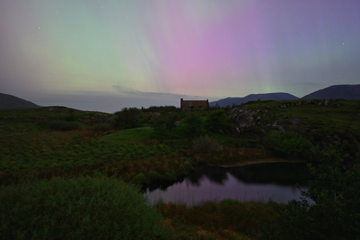 Aurora over landmarks in Connemara