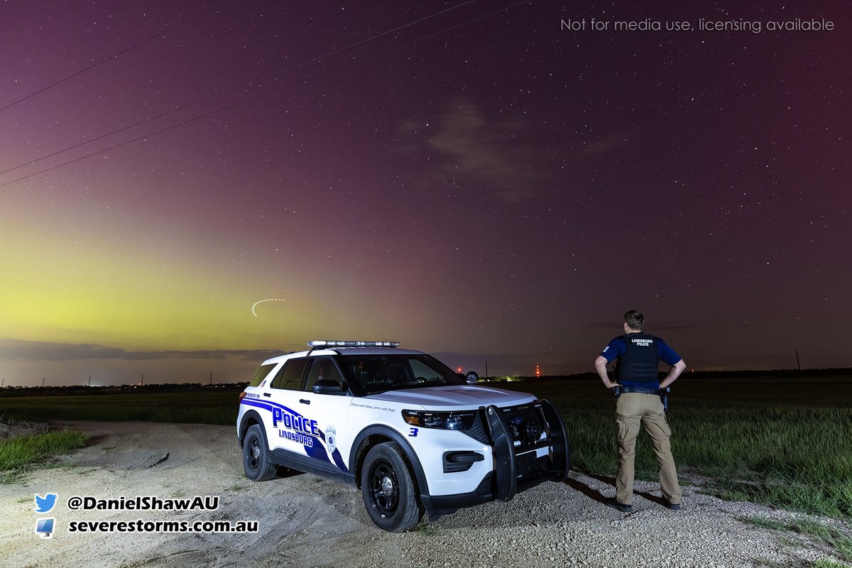 A local police officer from Lindsborg, Kansas takes a moment to admire the Aurora whilst on patrol. #Aurora