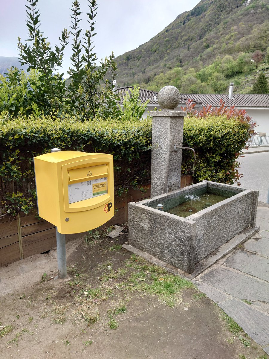 A lamp box, with one of Switzerland's innumerable fountains. This is up the hill from Bellinzona. #PostboxSaturday