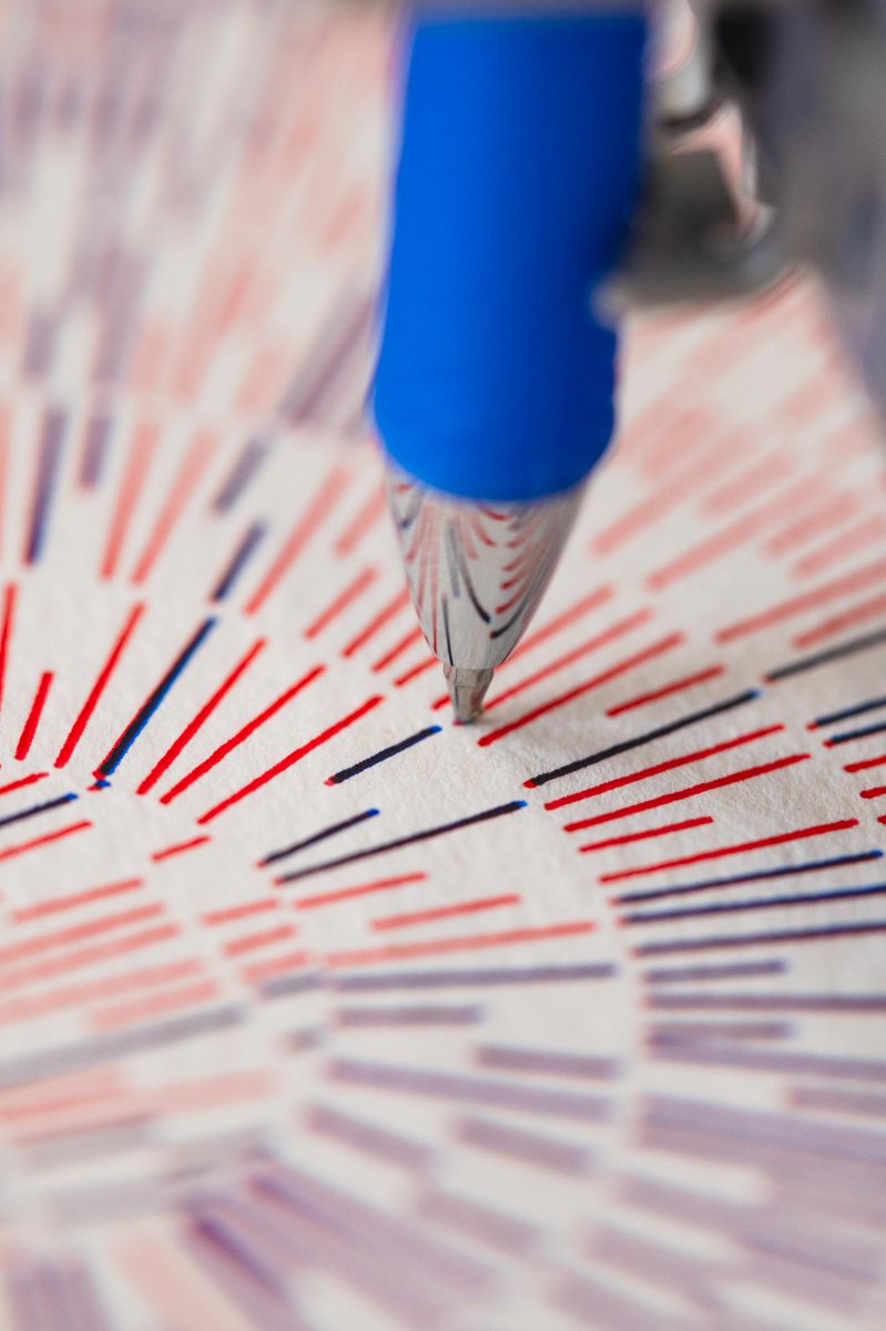 🤖 Exploring new designs with a splash of color! Radial blue and red dashes create a mesmerizing texture on the paper. Perfect for a unique zine addition. /via Normal Kitty 😺