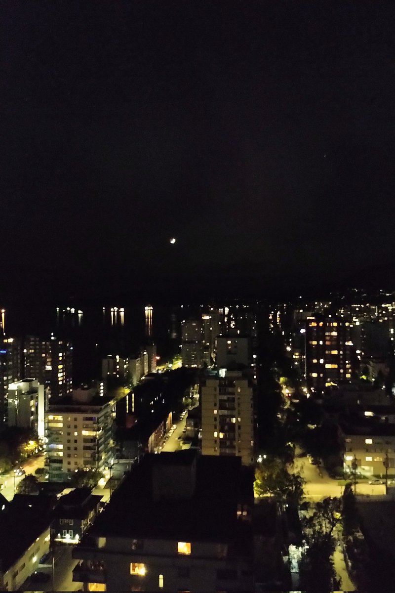 Squint and you can make out the faintest bits of pink and green in the #yvr night sky. #Auroraborealis