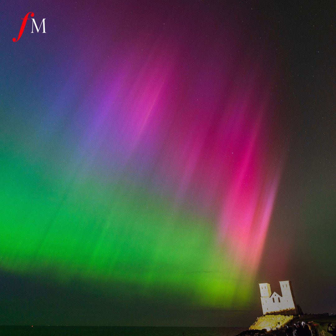 Northern lights over the 12th-century Reculver Towers in Herne Bay, Kent. 10th May 2024.