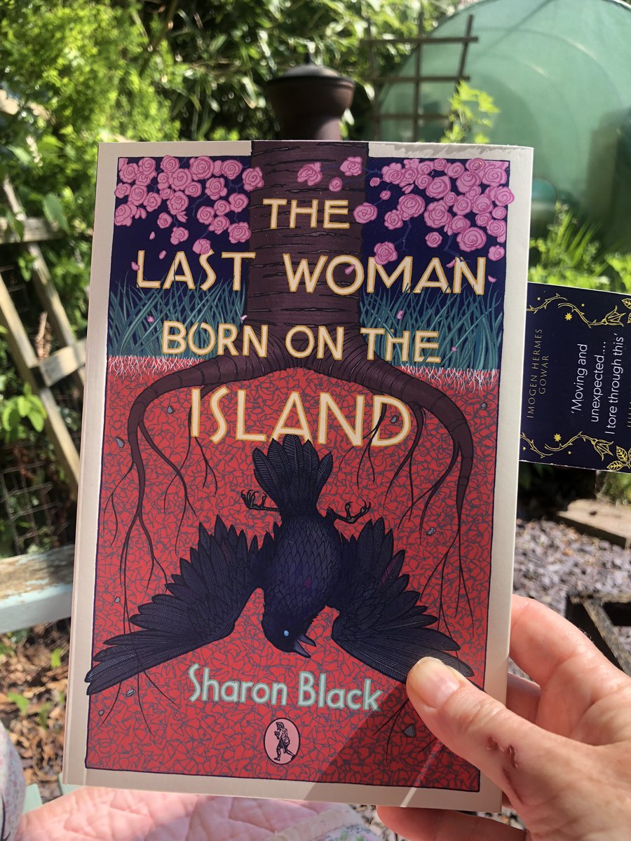 Reading poetry in the garden #thelastwomanbornontheisland #poetry #sharonblack