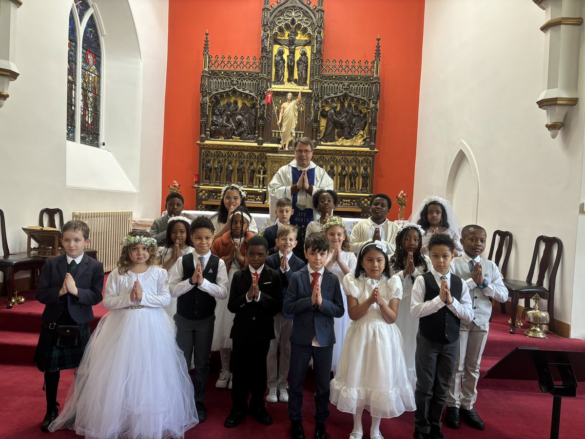 We are very proud of our 19 P4 children who received their First Holy Communion today. 🙏 📿 🍞 🍷
