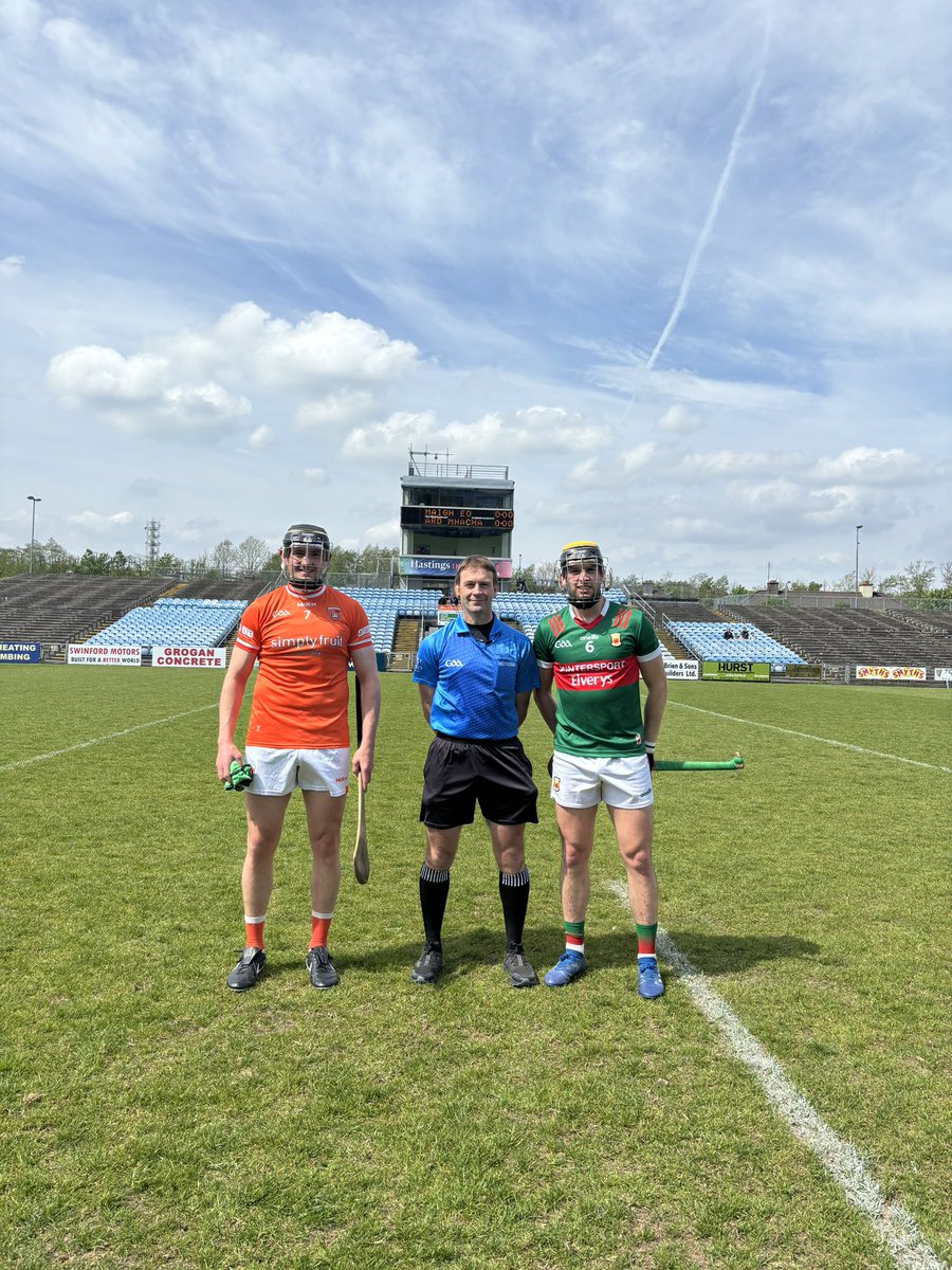 Captains Tiarnán Mac Cnáimhín and David Kenny pictured with today’s referee James Connors