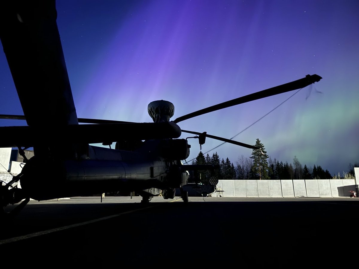 Our engineers took these amazing shots of our gunships overnight in Finland. #wearenato #northernlights #apache #attack