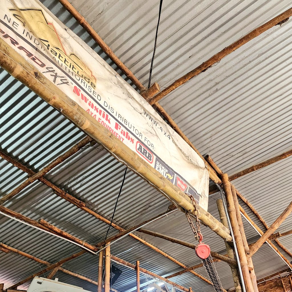 devakishor's tweet photo. Bamboo, if treated well.. can be so very strong and used for varied purposes.

Proof?

This, a fulcrum pulley used to lift heavy SUV engines... hung on bamboos! https://t.co/pc4zpUCNYq