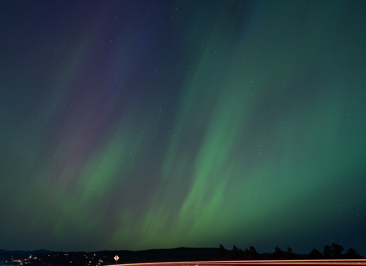 H2OEducator's tweet photo. Northern Lights from Helena Montana. Went down the road from our house, shot back over the road &amp; caught taillights in my long exposure. Went home at midnight &amp; Lights were still popping off so took photos around the backyard. Amazing to see in person https://t.co/KOUi7LgkAh
