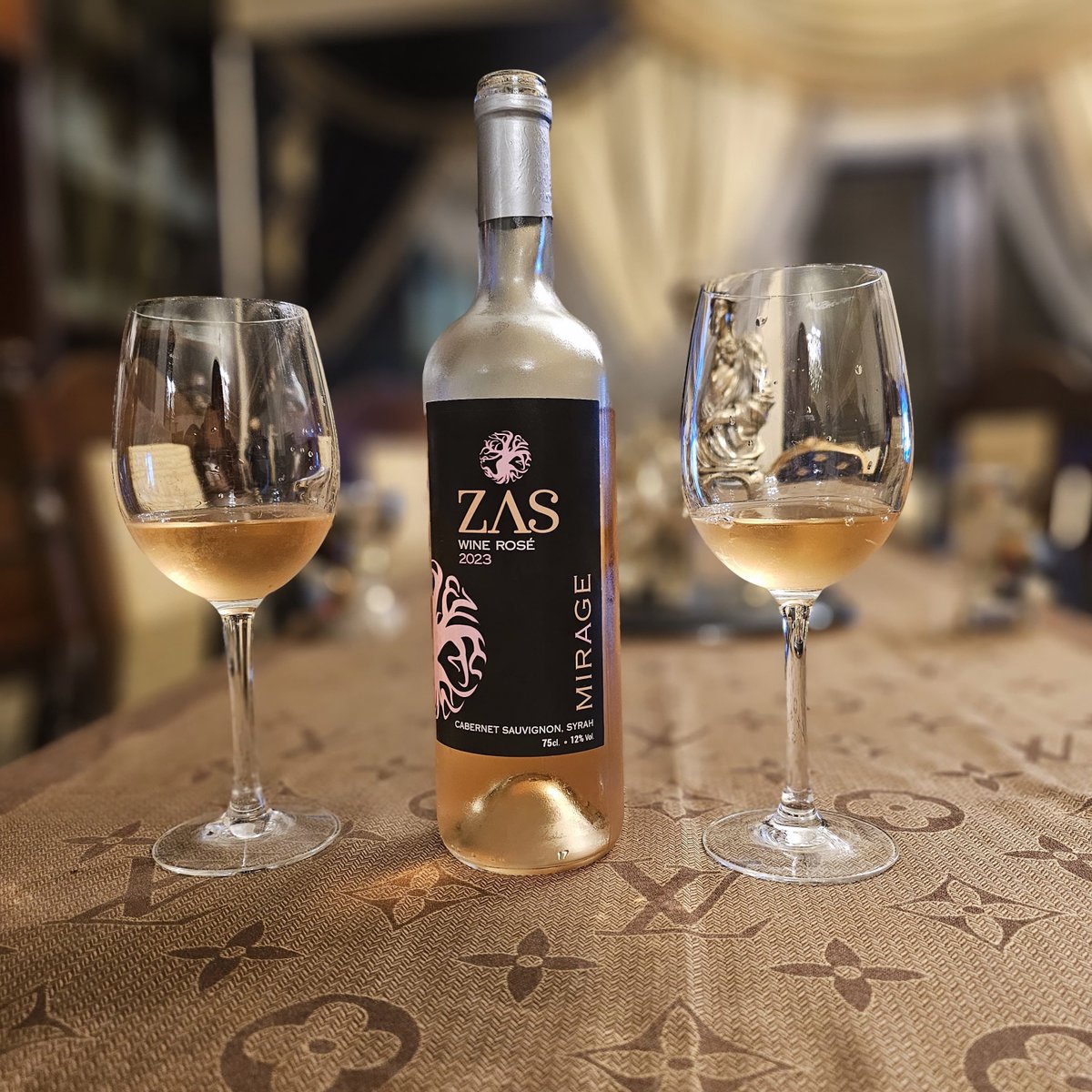 Amidst the spring night's embrace, savor the enchanting Mirage Rose. Let its delicate flavors elevate your evening with every sip. 🌸 #wine #winelovers #Tokenization