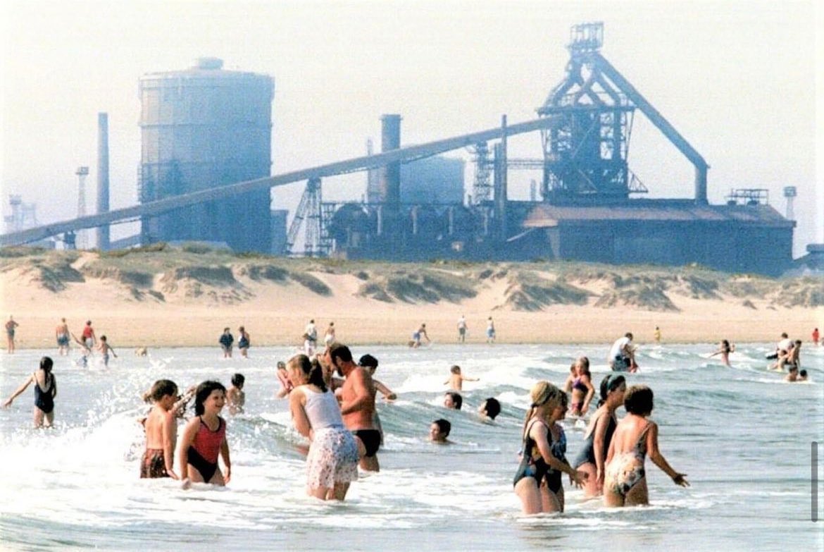 Having a dip at Redcar in the shadow of the blast furnace during the summer of 1995.

📸: Carl Conway