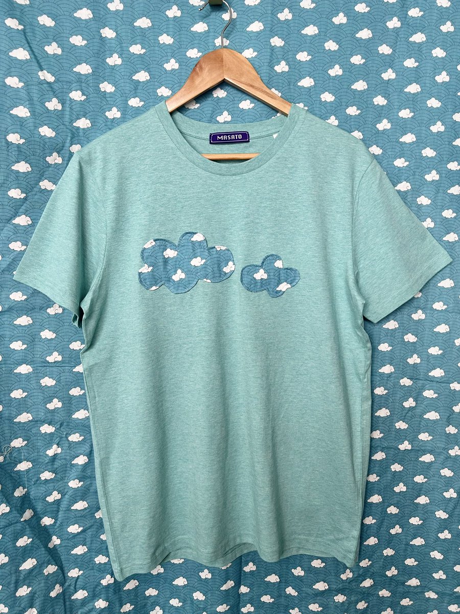 Ain’t bluffing my bespoke T-shirts sell very quickly Possibly due to low price £35 Two fluffy clouds pattern cut quilted and stitched onto a 100% organic cotton sky blue tshirt #MCFC #cloudsecurity #auroreboreale #ukgiftam #shopindie masato.co.uk