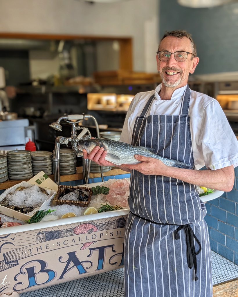 Chef Mike with our super fresh sea bass for two, soon to be on the grill this sunny Saturday! 🐟 #seabass #ouichef #thescallopshell