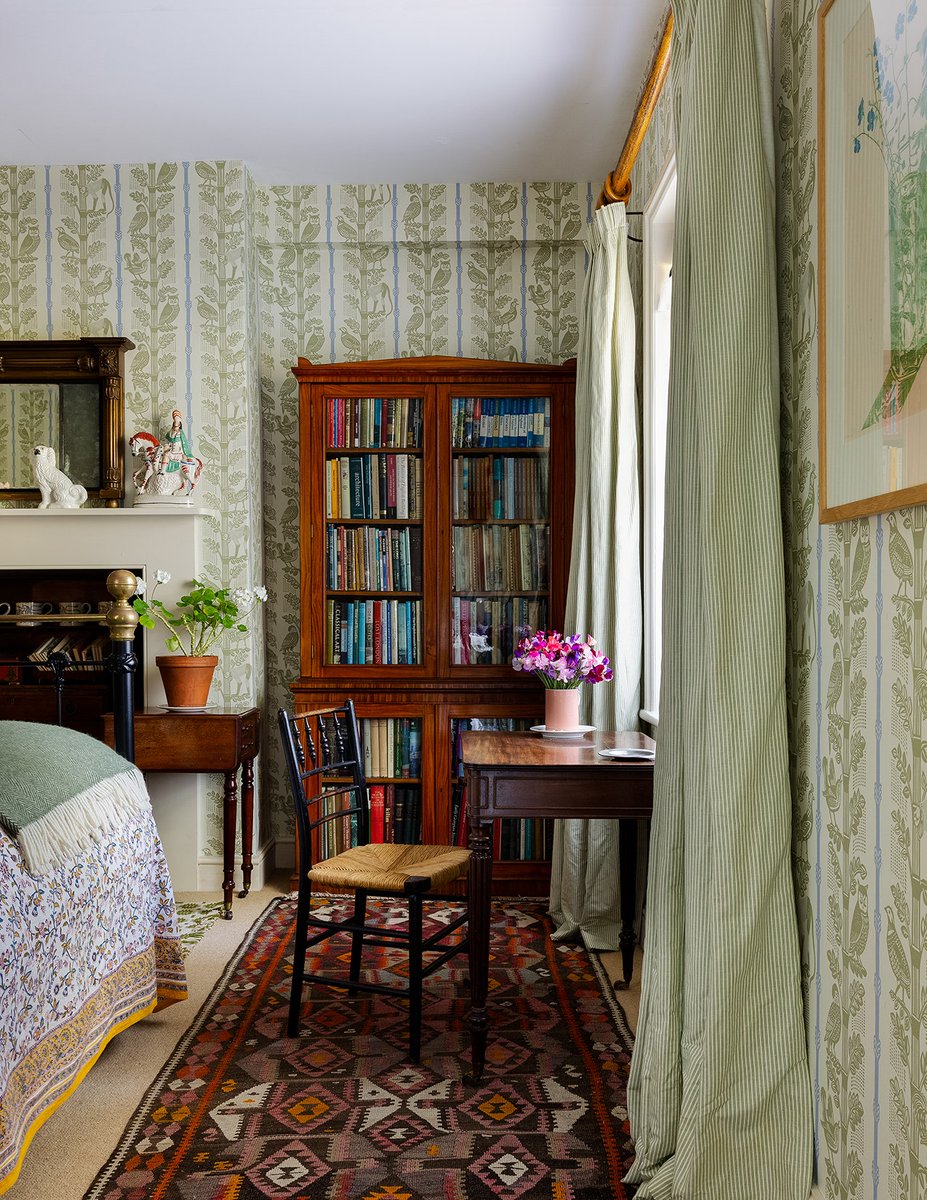 A Regency bookcase anchors this pretty green bedroom in George Saumarez-Smith's house: trib.al/c2JYwjG