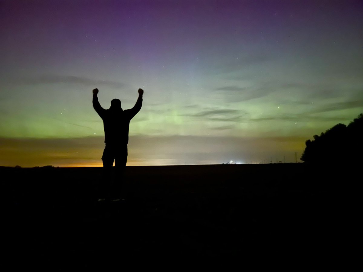 Took this photo of my husband last night just north of Rossville, IN, about an hour NW of Indy. The #aurora could be seen with the naked eye but these colors showed up much better through the camera lens on long exposure. Taken with my iPhone. Did you see it? #INwx