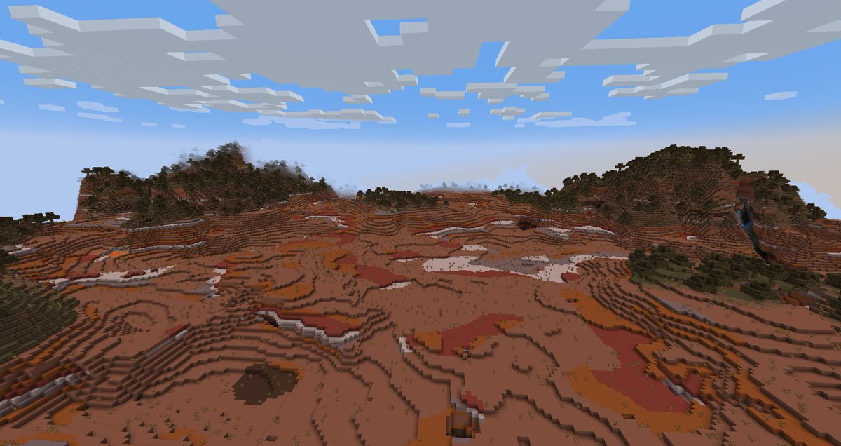 Found the coolest badlands biome ever while messing around. I've never seen it generate like this, its right next to spawn too. Seed: 5607067909119670166