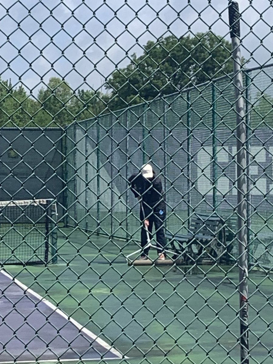Even our AT Joe is out there working hard to dry the courts today #tigerup