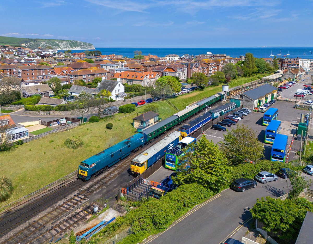 D1015 'Western Champion' departs Swanage with the 14:15 service to Norden as Studlands white chalk cliffs & the English Channel bask in some fine Spring sunshine. 📸 ☀️ @SwanRailway ⭐️ Framed Prints available ⬇️🏞🚂😅 railwayartprintshop.etsy.com #swanage #class50 #D1015 #railways