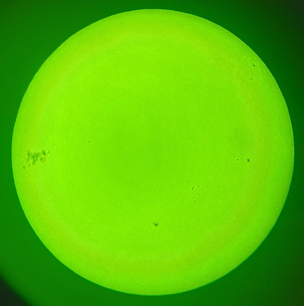 A smartphone photo of the Sunspot, through a home made Solar Telescope I built aeons ago! I think I should crack out the webcam and see if I get a better shot!