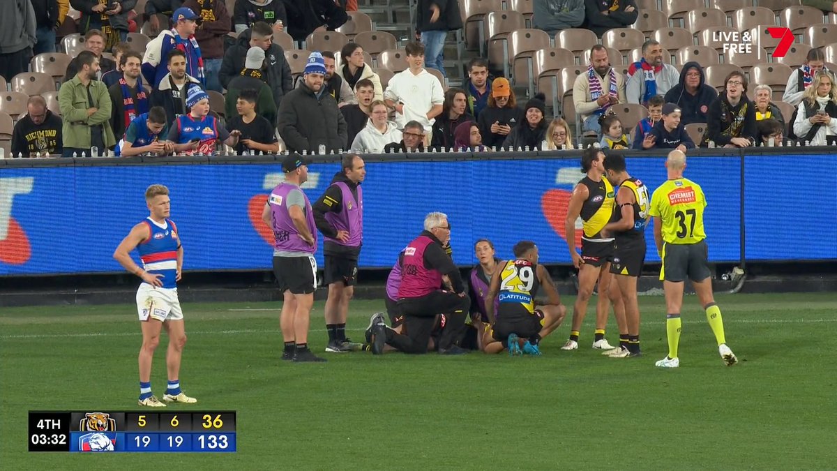 The stretcher has been called for Maurice Rioli Jnr after a tangle of legs in tackle. A horrible night for the Tigers 😔 #AFLTigersDogs