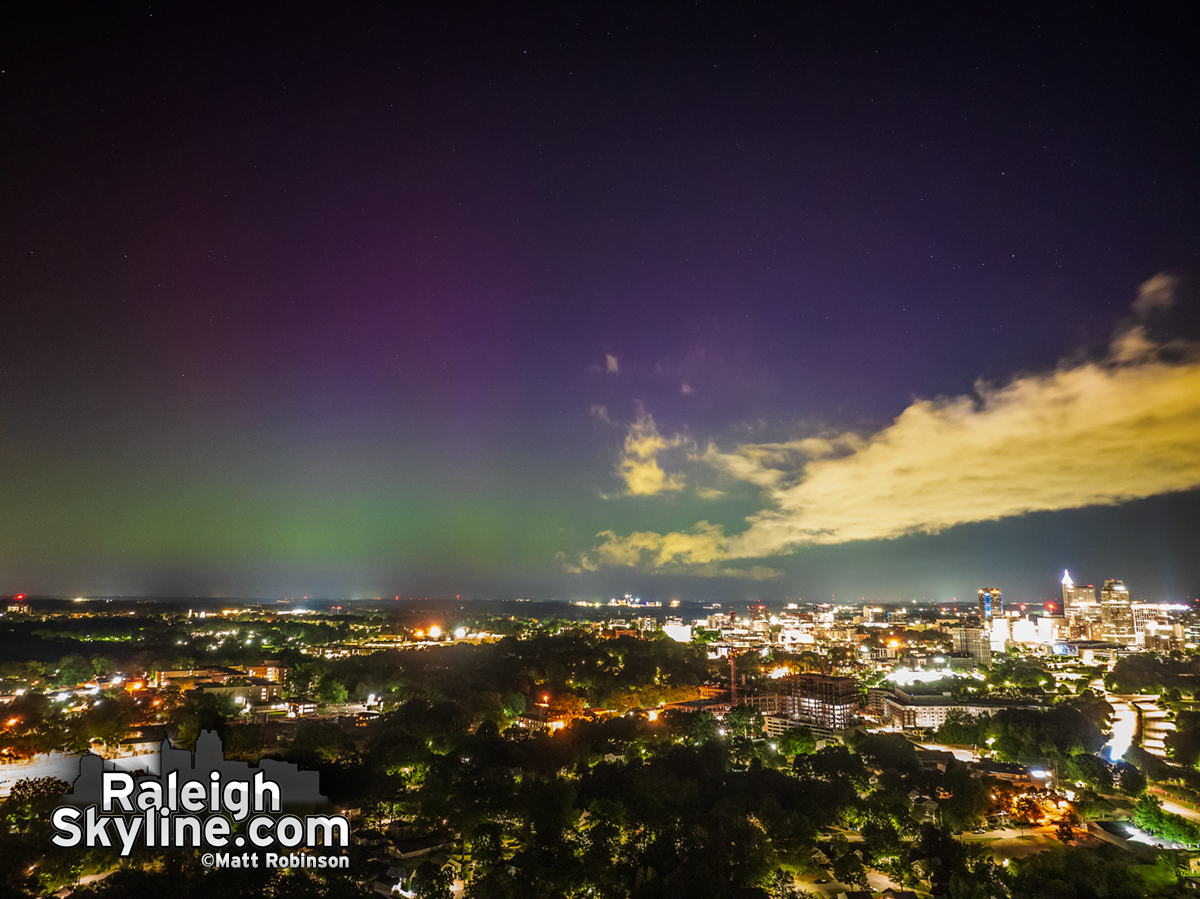 Faint green and purple Aurora glow on the northern horizon over downtown Raleigh around 3:30 AM. These weren't as bright as the those visible around 9:45 PM. Untimely clouds blocked the view for most right after dark. Here's hoping tonight offers another opportunity.