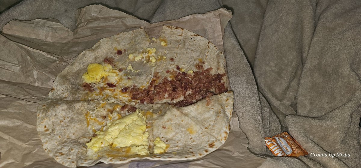 Adragonsally's tweet photo. @tacobell  my steak quesadilla with.....? Bacon and barely any eggs....damn guys...do better.  This food ain't cheap. https://t.co/Q8zXMbOHm7