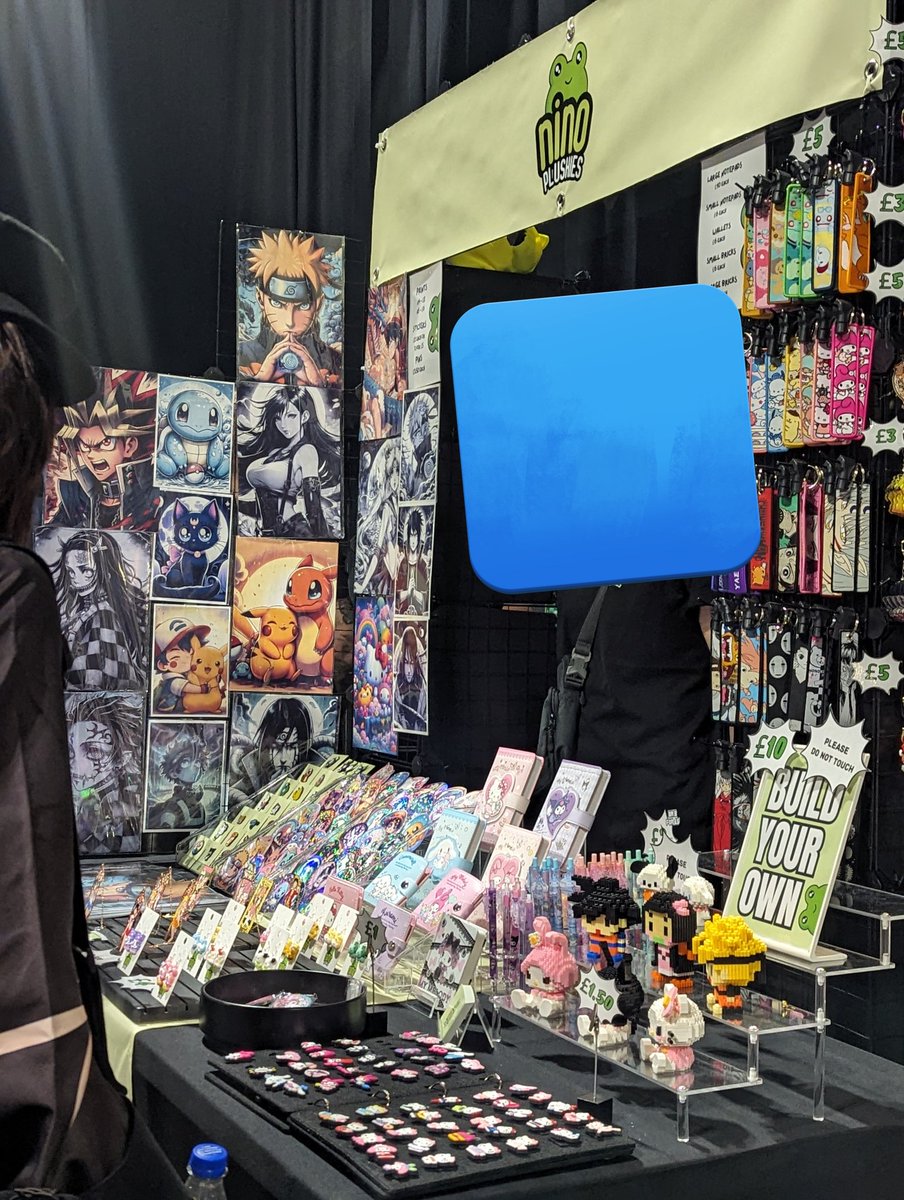 Gingerrrre's tweet photo. Normally acme/raicon has one of the best artist alleys I've ever seen, but this person is blatantly selling ai generated prints/stickers. Me and my friend were unsuccessful in our applications for the artist alley, so it's very disappointing to see this. @Acmecomiccon #raicon https://t.co/NUaplGeDVr