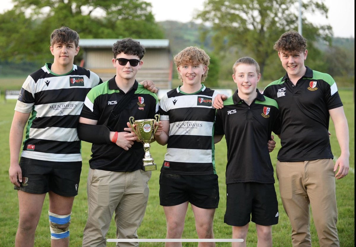 LlandoveryColPE's tweet photo. And that’s the hat trick of success for our College pupils who also play @llandeilo_rfc Youth.  They won the Carmarthenshire Youth Cup last night which adds to their League and National Cup wins!! Massive achievement boys! 👏🏆🏆🏆 #treble https://t.co/oUIm3WQwll