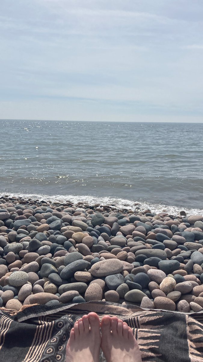 Enjoying the sun at St Bees beach, with the kids.