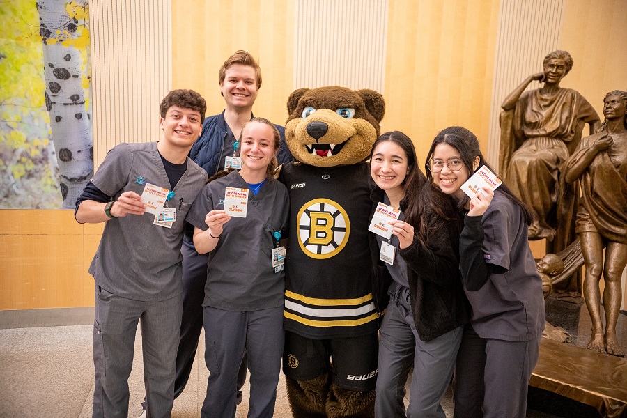 Yesterday the @NHLBruins mascot Blades, and representatives from the team, took some time to recognize and show appreciation for members of our @BWHEmergencyMed. Blades visited staff and gave away $5,000 worth of Dunkin gift cards to nurses and clinical staff. #NursesWeek