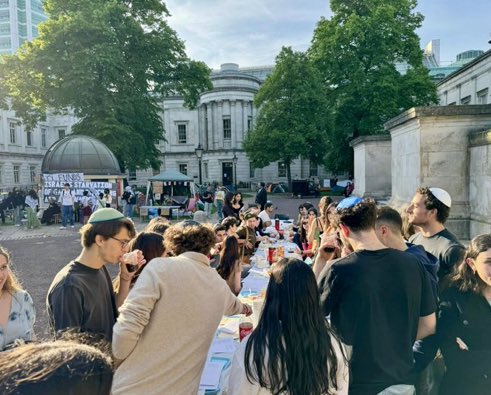 Jewish students at UCL, London, sharing a pre-shabbat meal. In the midst of so much hatred, a bit of joy.
