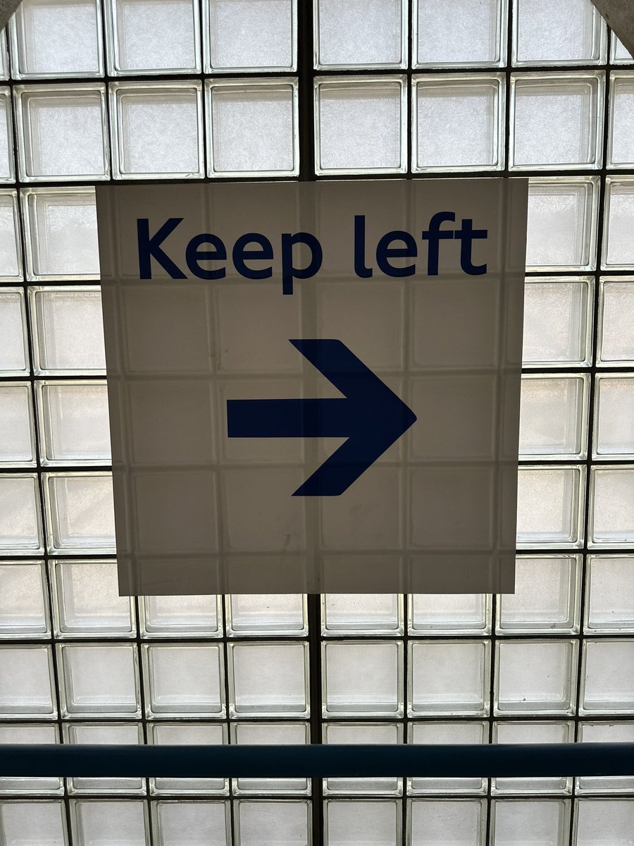 On the face of it, this is a funny mistake (no, not an oxymoron). But, when you're in the context (the walk between Jubilee Line & West Ham overground) you understand that within the unavoidable right-hand turn, one must keep left. How many tweets are similarly misunderstood?