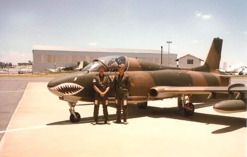 This is the only photo I have ever seen with a SAAF Impala Mk II with the 'infamous and well loved sharkmouth' applied.
L-R: Capt's Johan Whiteman and Dudley Trollip at 4 Squadron Lanseria, circa 1985/86.
Anybody have any more photos of this particular Impala?
Credit to Renier