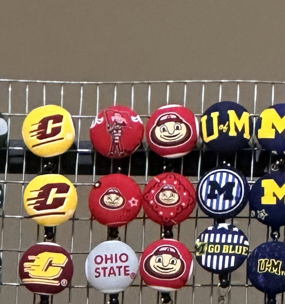 I get that I should be advertising my craft show stuff…. but did this vendor purposely put Ohio state stuff between the C and the UofM?? 🧐