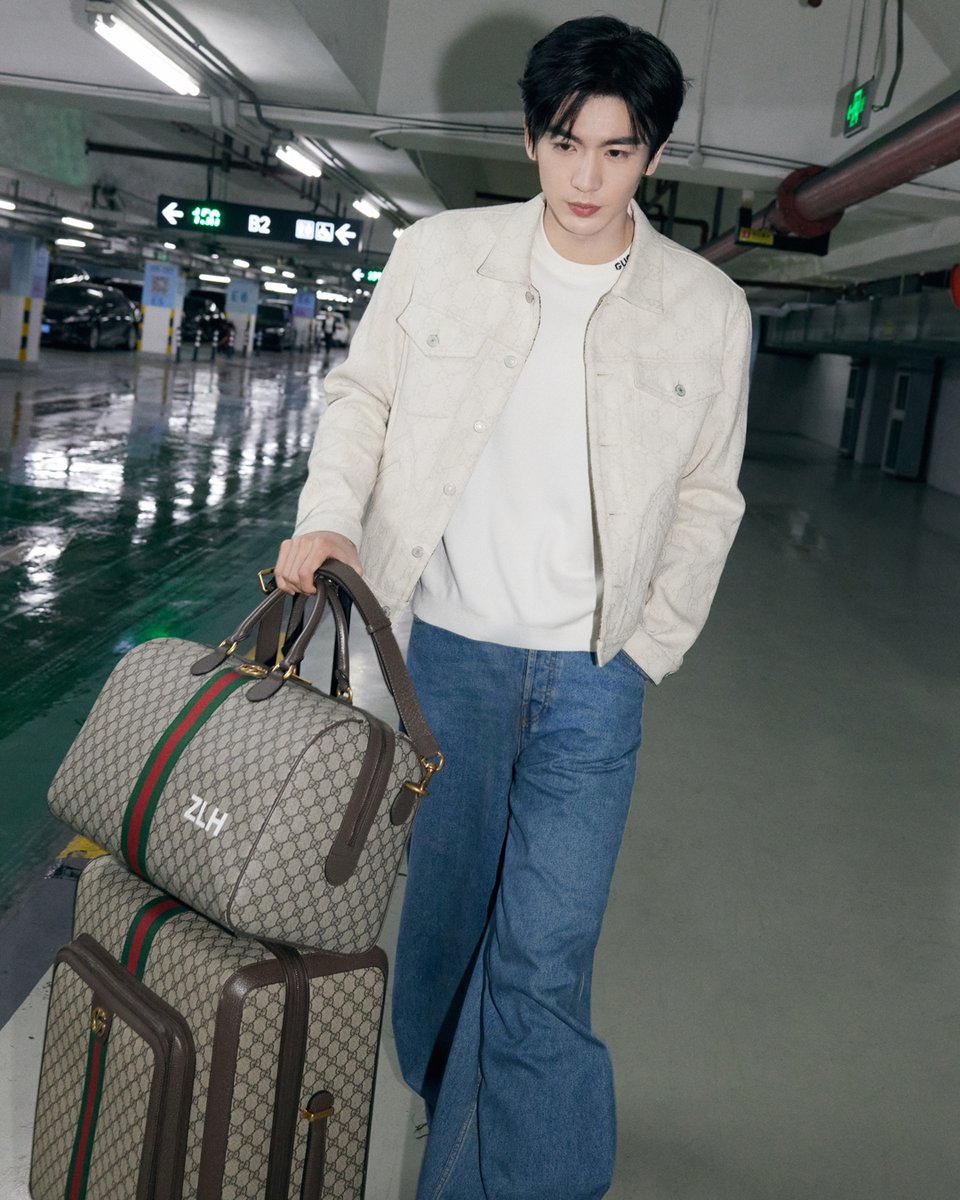 Actor #ZhangLinghe on his way to London for the #GucciCruise25 fashion show with his personalized #GucciValigeria travel pieces in hand.