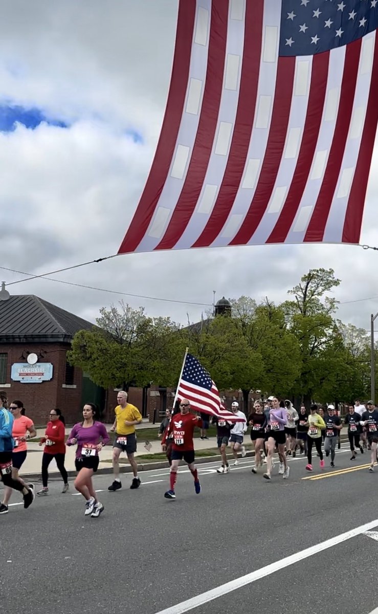 Ladder 7 proudly displays the Flag for  the 22nd Annual Boston Marine Corp Honor Run at Carson Beach. ⁦<a href="/USMC/">U.S. Marines</a>⁩